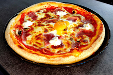 Restaurant Le Truth Béziers dans la ZAC de Montimaran propose des pizzas, ici une pizza Regina ( ®  le truth)